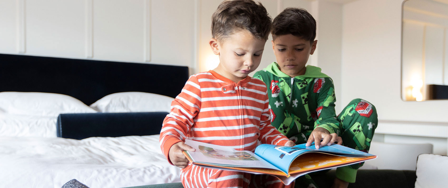 boys on bed reading